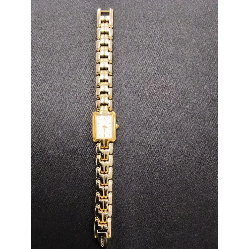 Vintage Seiko 1N00-6T10 Women's Watch Rectangle Gold Tone White Face #W5165